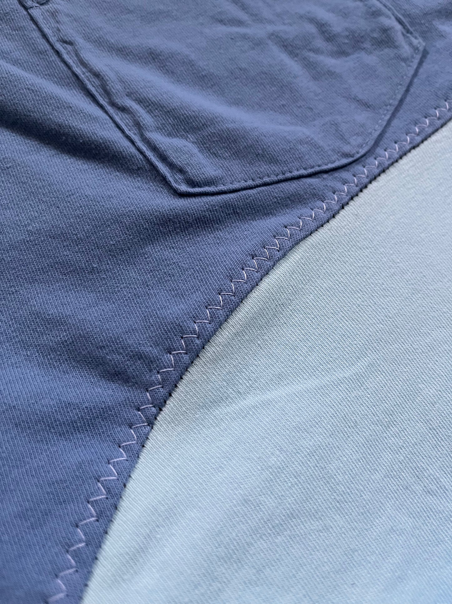 This blue and turquoise 2-tone shirt is a perfect sustainable alternative to your average t-shirt. Picture yourself in this incredibly cool tee that will make you stand out in a crowd. The unique design of this tee combines two amazing colors to create a visually striking and stylish look. With its eye-catching color combination, this tee is perfect for those who want to make a bold fashion statement.