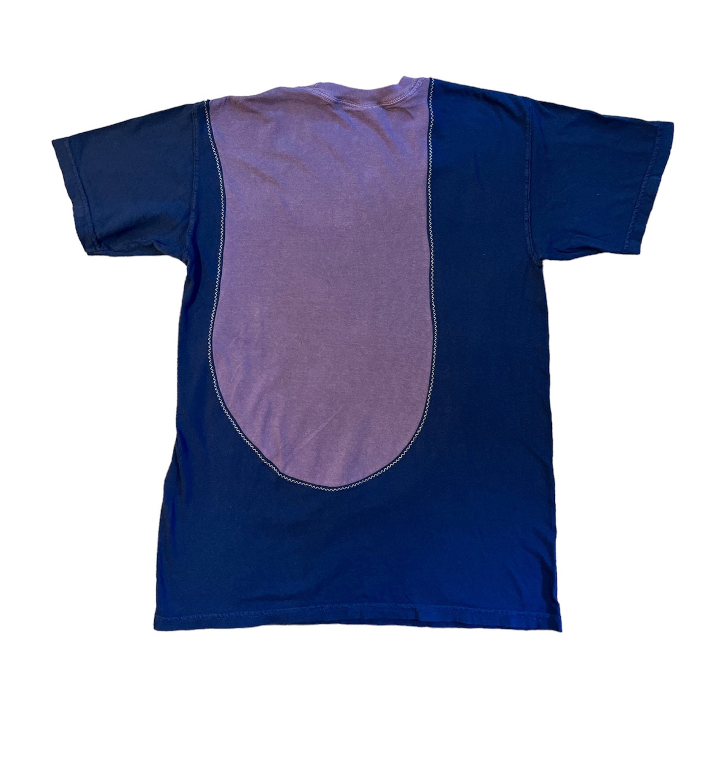 This Dark blue and purple 2-tone shirt is a perfect sustainable alternative to your average t-shirt. Picture yourself in this incredibly cool tee that will make you stand out in a crowd. The unique design of this tee combines two amazing colors to create a visually striking and stylish look. With its eye-catching color combination, this tee is perfect for those who want to make a bold fashion statement.